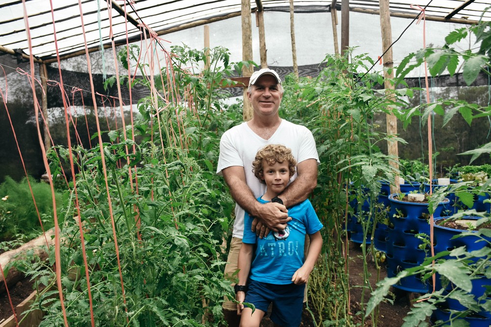 scott-with-son-ian-in-vegetable-farm_31024432203_o